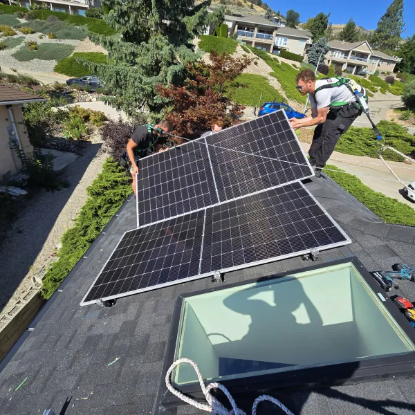 Installers fitting panels around a skylight